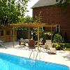 Armour Heights Project - Photo 3
After
Custom designed stone patio created to surround pool.
Gorgeous garden shed built to provide extra storage.