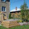 Kingsway Project  - Photo 3
After
New cedar stairs and new layout create an elegant transition from home to garden. 